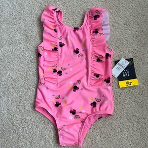 Toddler girls size 4 Gap Pink Minnie Mouse Swimsuit. NWT and hygiene liner.